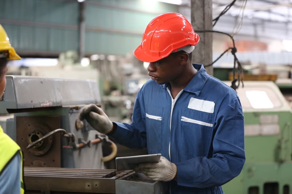 Field representative in industrial work environment