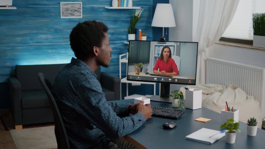 Operations professional working remotely on a video call